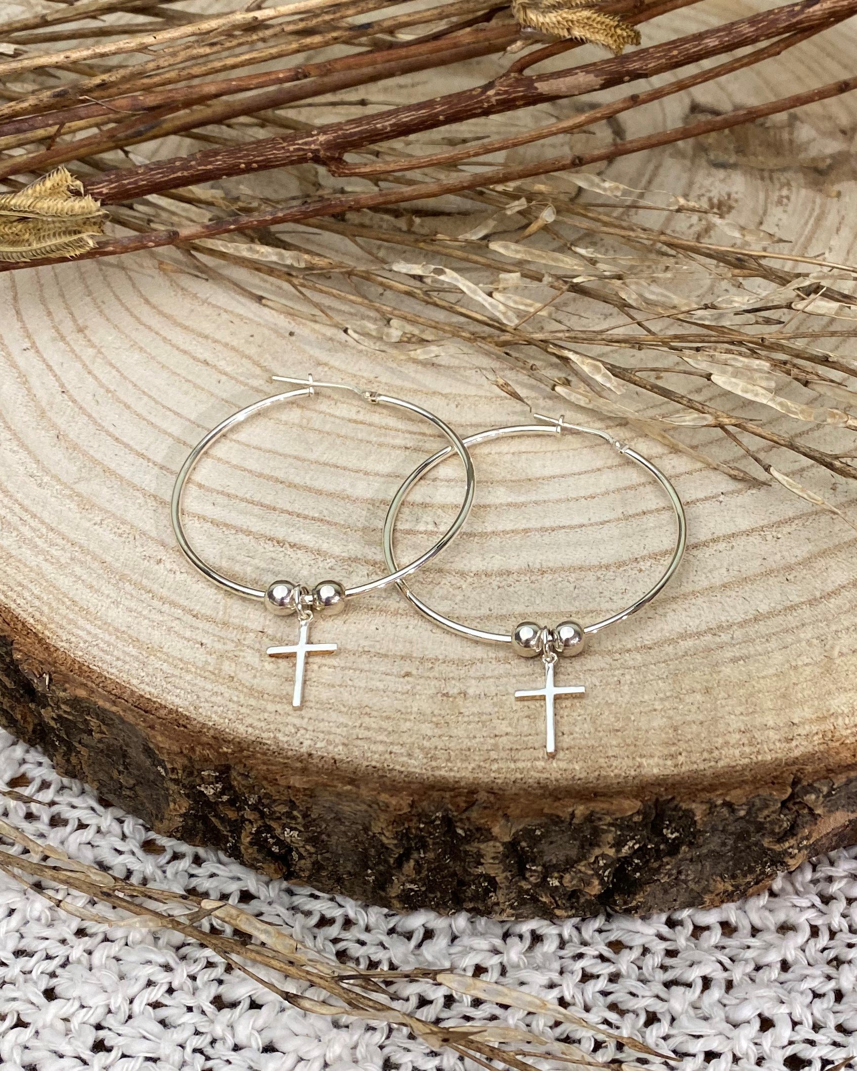 Earrings 'with cross charm'